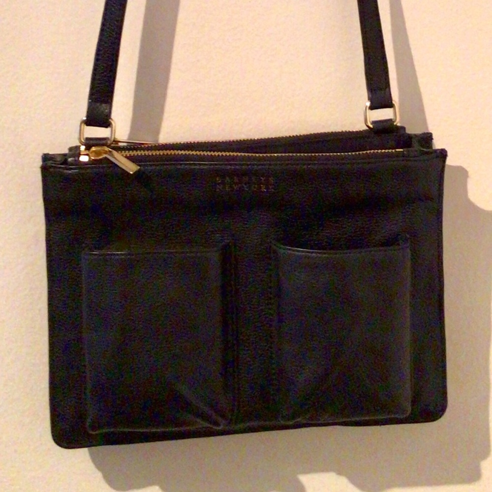 Barney’s unused leather crossbody bag